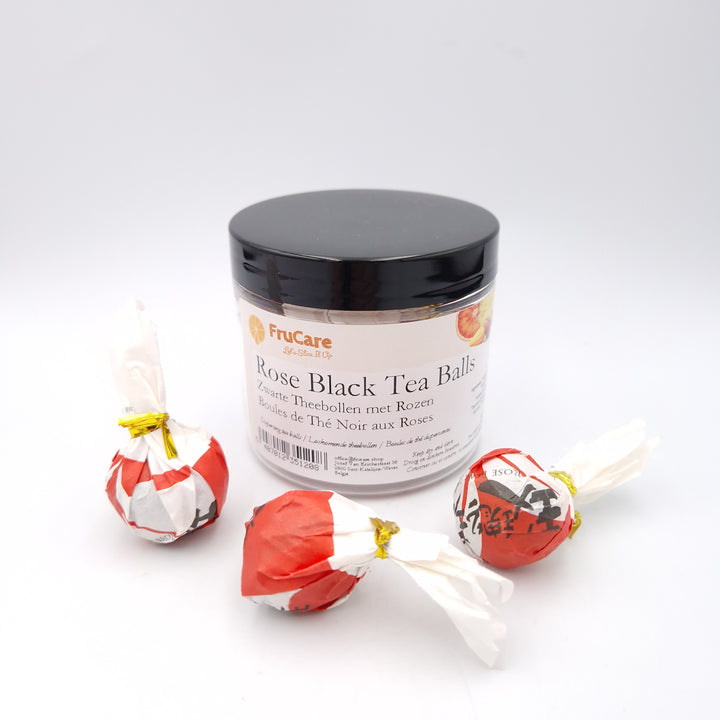 Loskomende Zwarte Theebol met Rozen