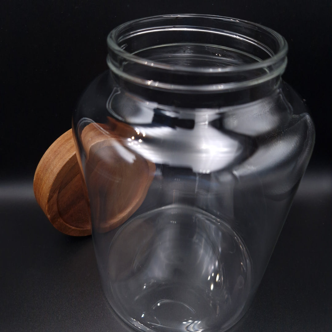 Glass storage jar with wooden screw lid