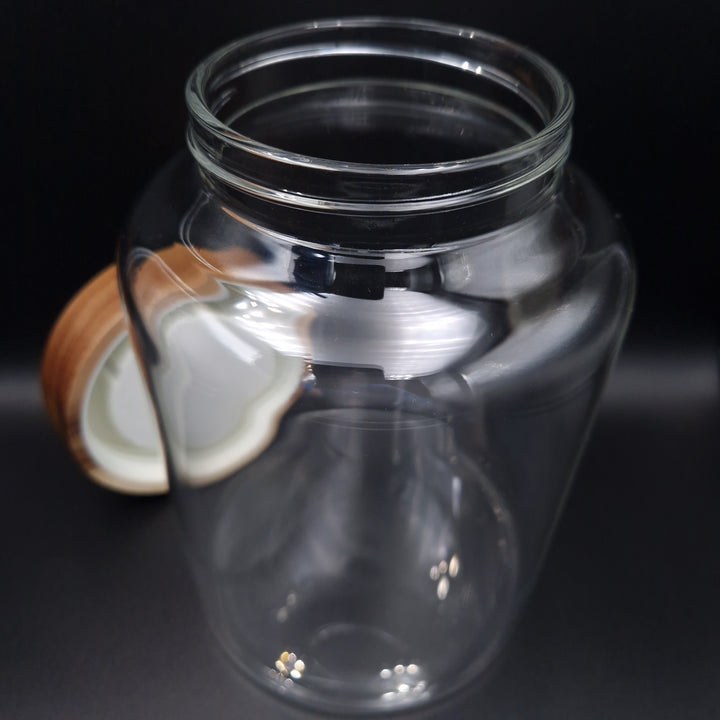 Glass storage jar with wooden screw lid